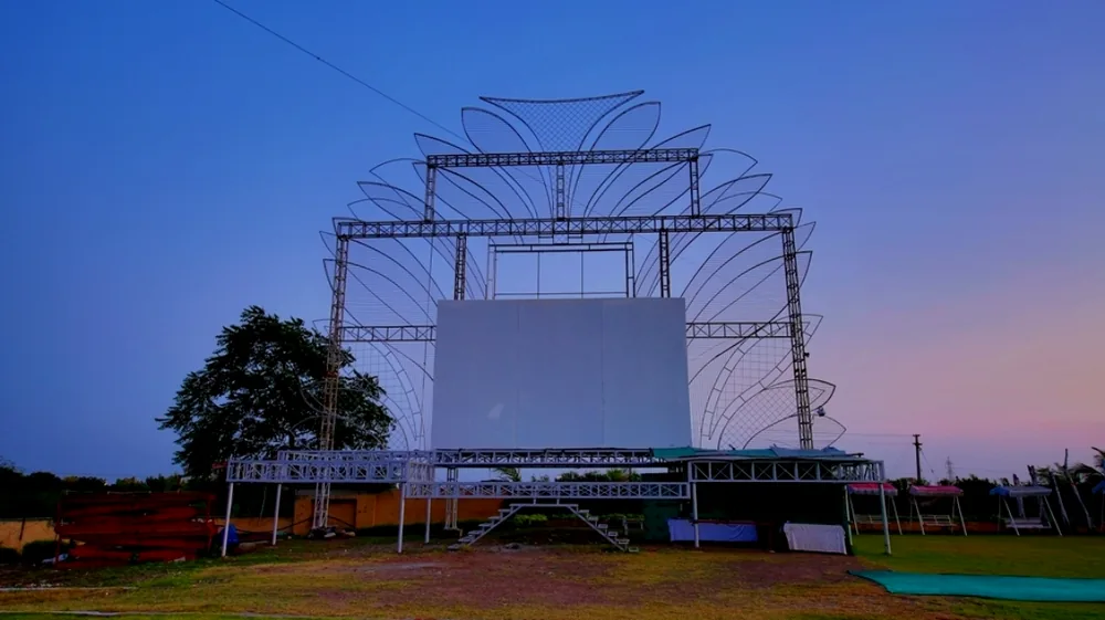 Outdoor cinema screen set up on the resort lawn