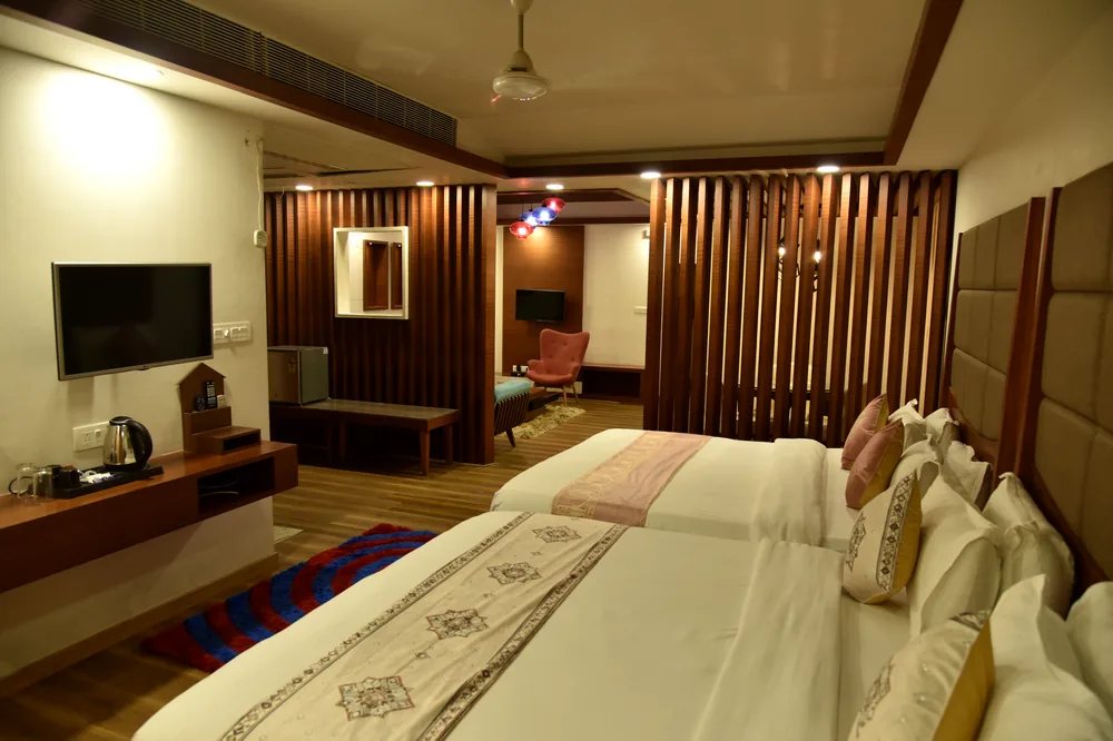 Family Suite with a spacious layout, multiple bedding options and a private Jacuzzi