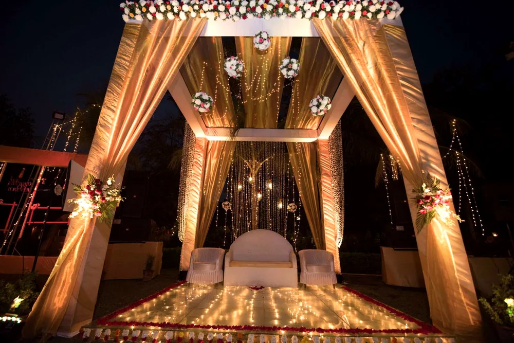 Golden mandap set for a ceremony