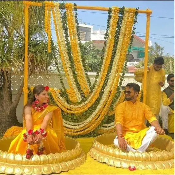 Mandap decorated with marigold garlands